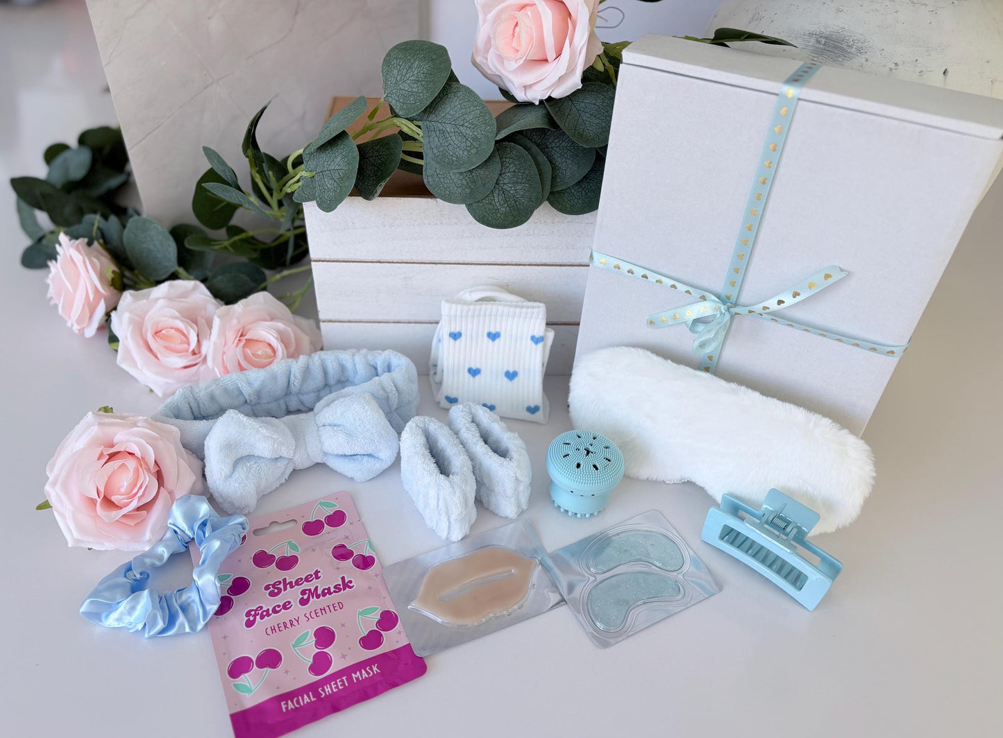 Close up of Mini Blue Pamper box showing spa themed contents - personalised pamper gift UK