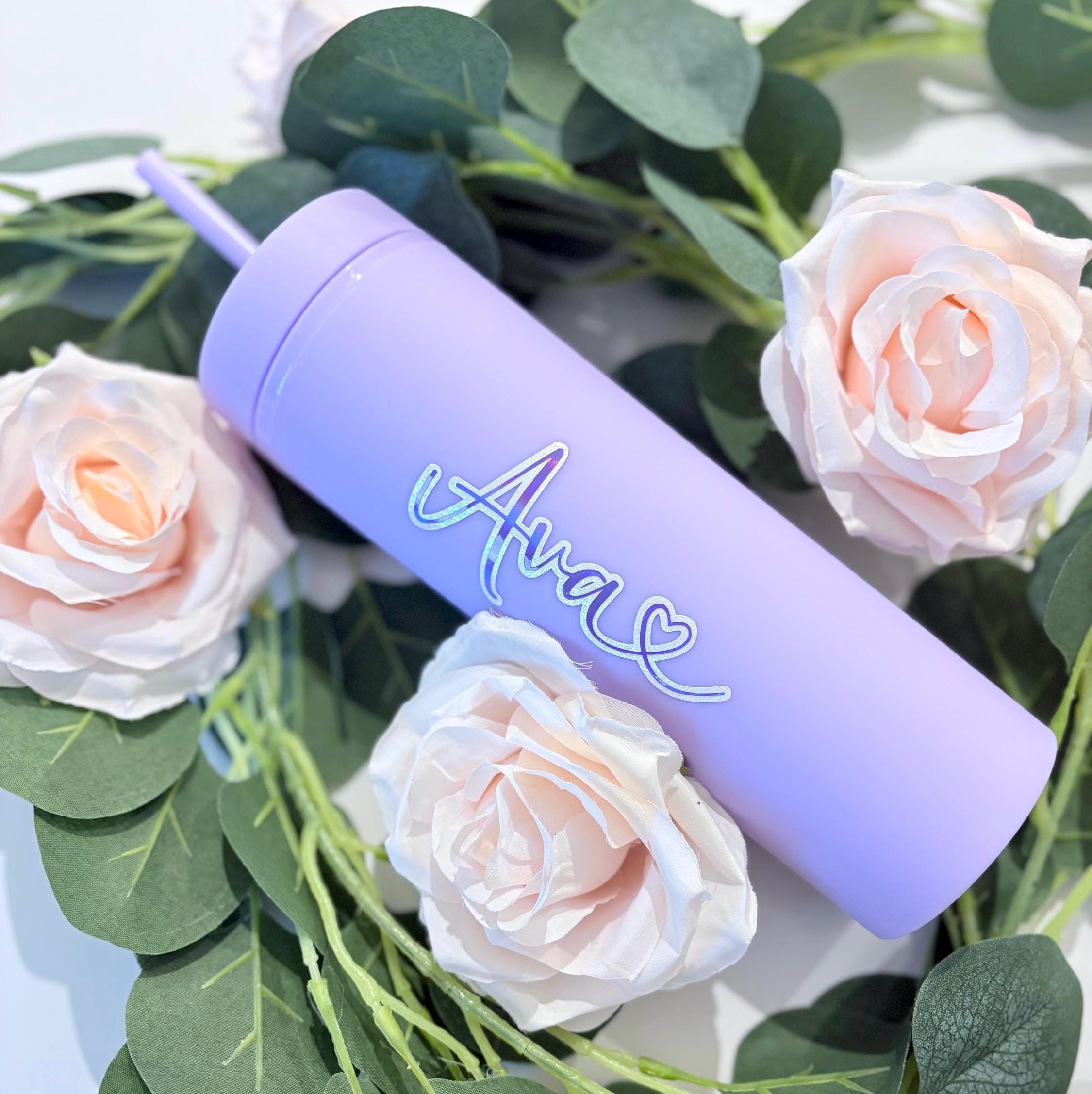 Close up of purple personalised water bottle showing custom engraving detail - 16oz bottle UK