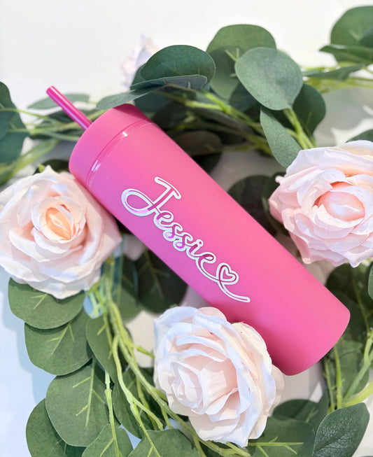 Close up of hot pink personalised water bottle showing custom engraving detail - 16oz bottle UK