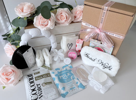 Close up of Ultimate White Pamper box showing spa themed contents - personalised luxury pamper gift UK