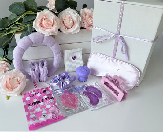 Close up of Mini Purple Pamper box showing spa themed contents - personalised pamper gift UK