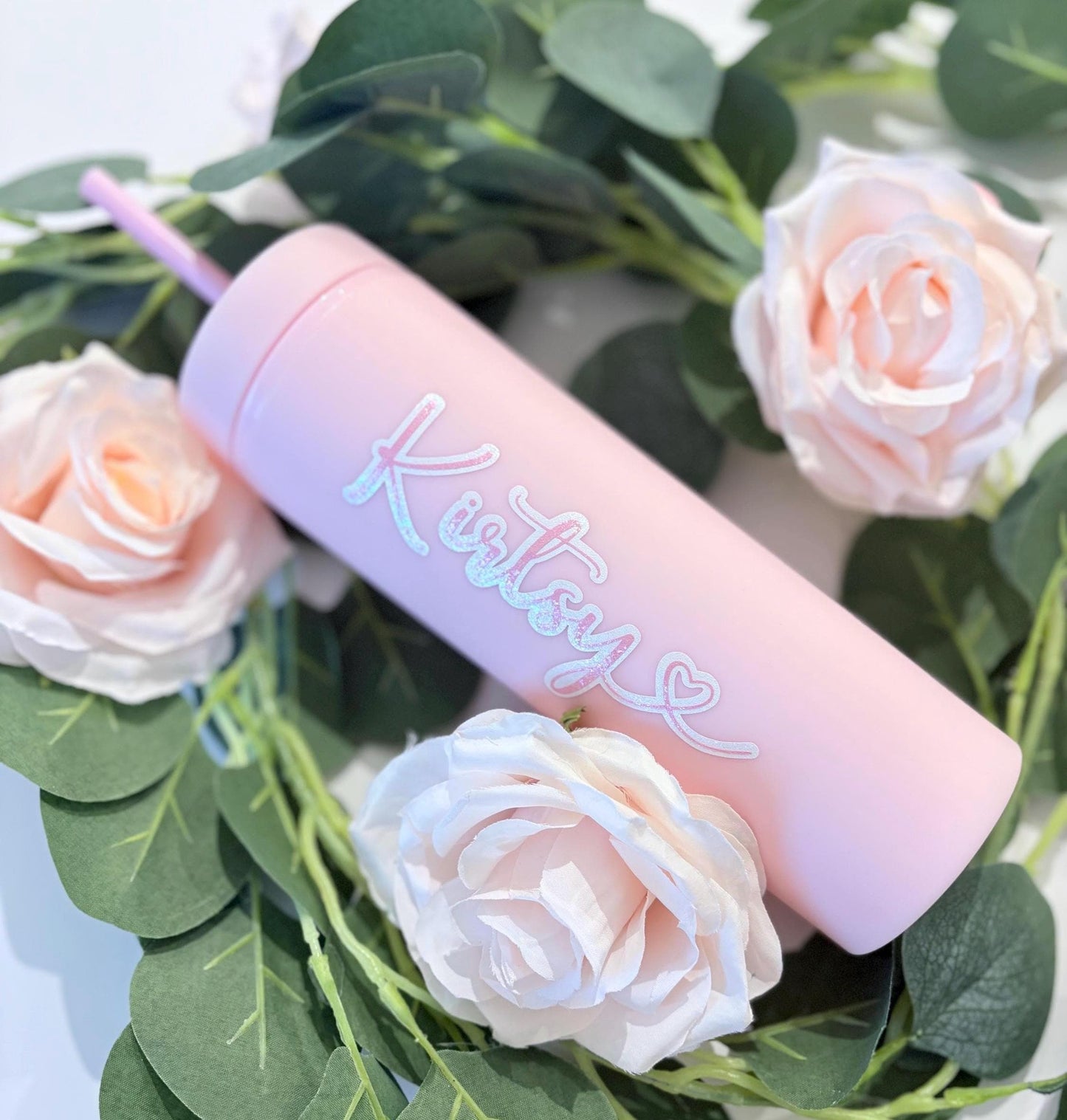 Close up of pink personalised water bottle showing custom engraving detail - 16oz bottle UK