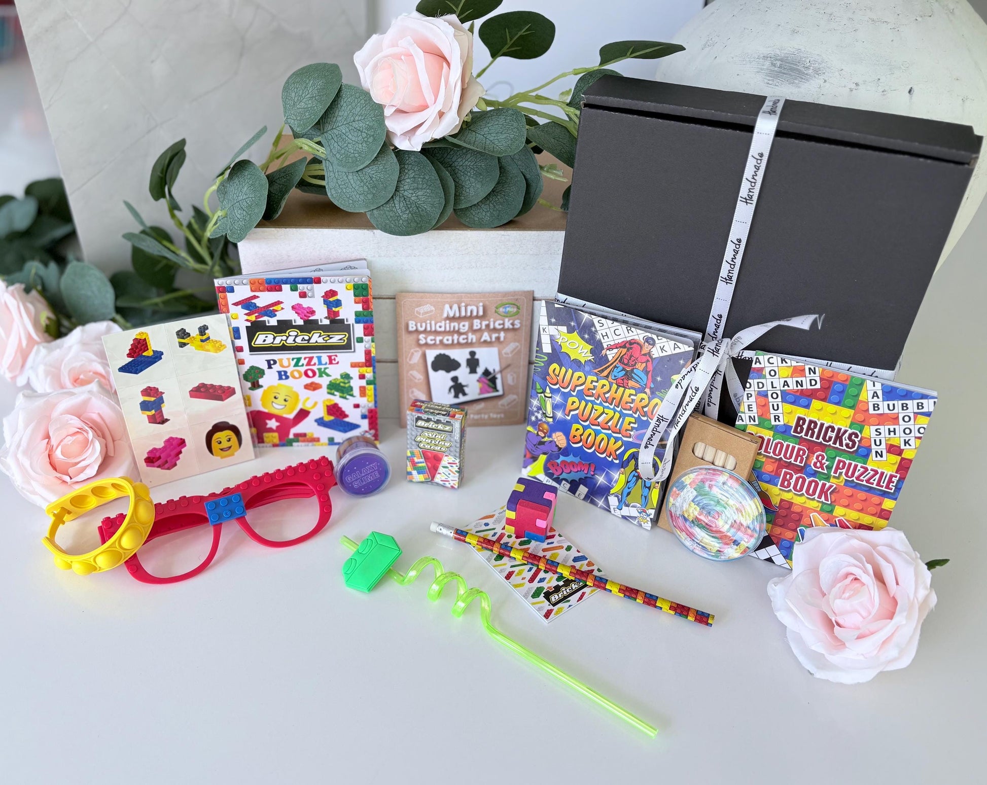 Close up of Brickz Gift Box showing building block themed contents - personalised children's gift UK