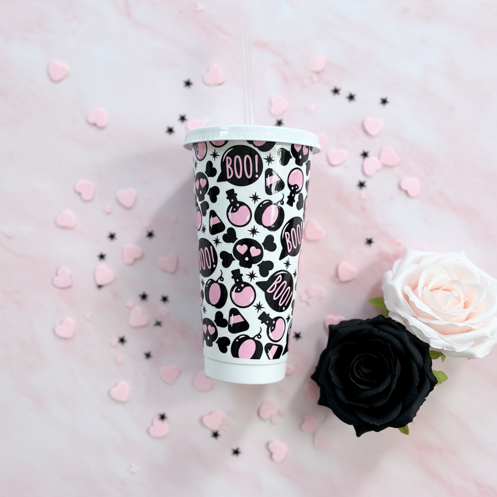 Boo Love 24oz Cold Cup UK flat lay with black and pink roses, pastel pink hearts and black star confetti on light pastel background