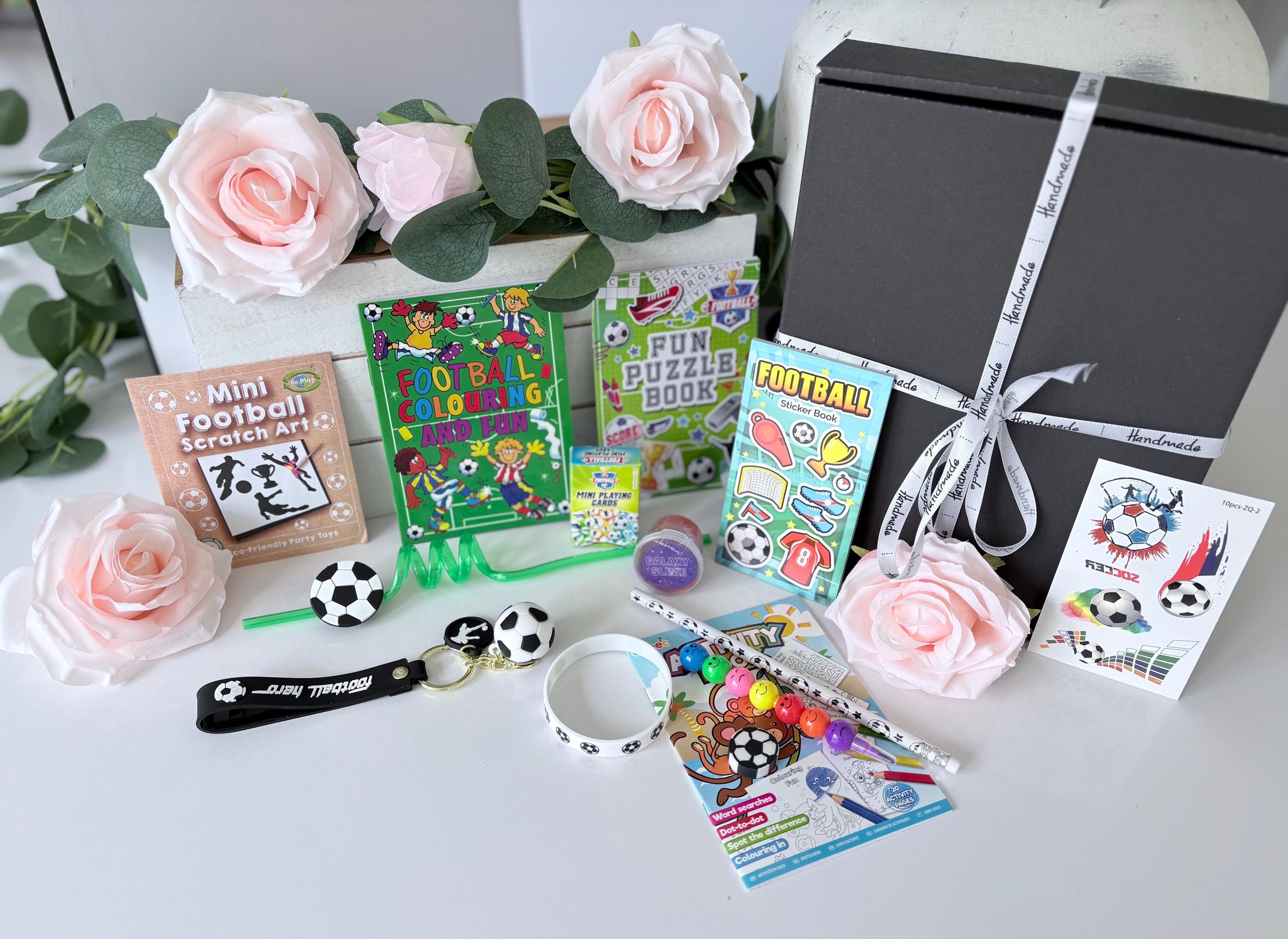 Close up of Football Gift Box showing football themed contents - personalised children's gift UK