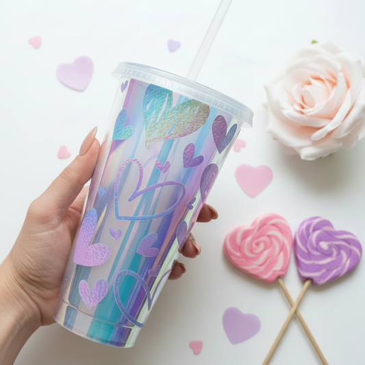 Holographic Sketch Heart 24oz Cold Cup held in hand with pastel roses and heart lollipops - romantic gift tumbler UK