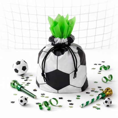 Mini football themed drawstring party bag with green tissue paper and goal net backdrop, handmade in the UK