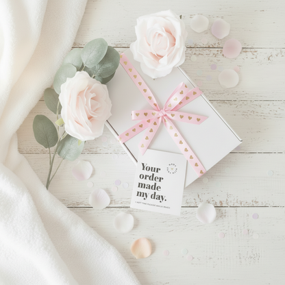 White luxury gift box with pink heart ribbon bow - mini pink pamper gift UK